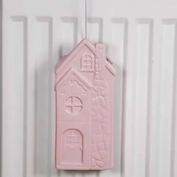 Ilmankostutin Talo vaaleanpunainen