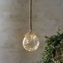 Valopallo juuttinarussa 15 cm